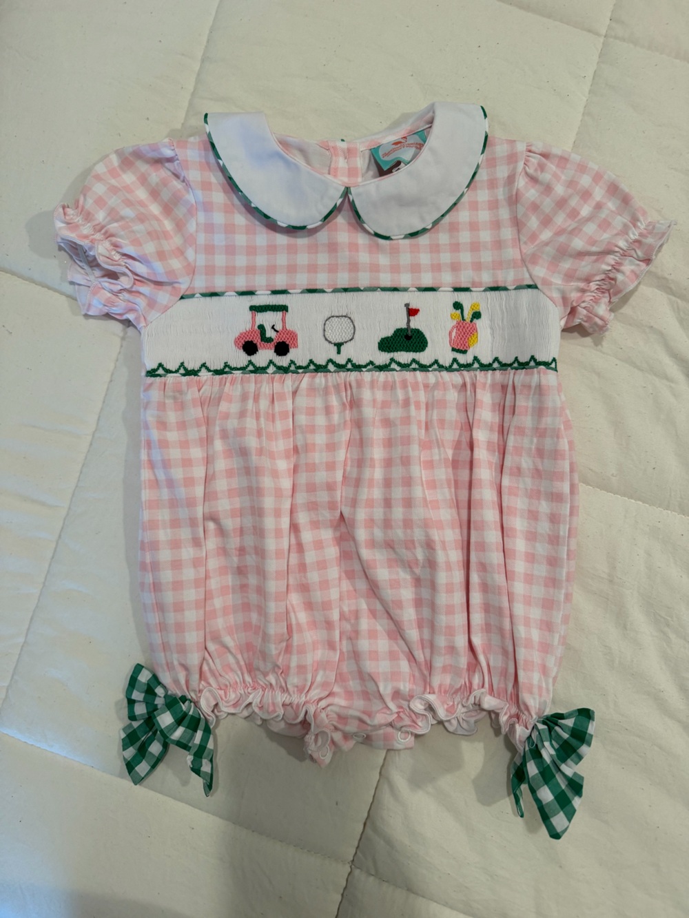 The Smocked Flamingo girls golf bubble romper